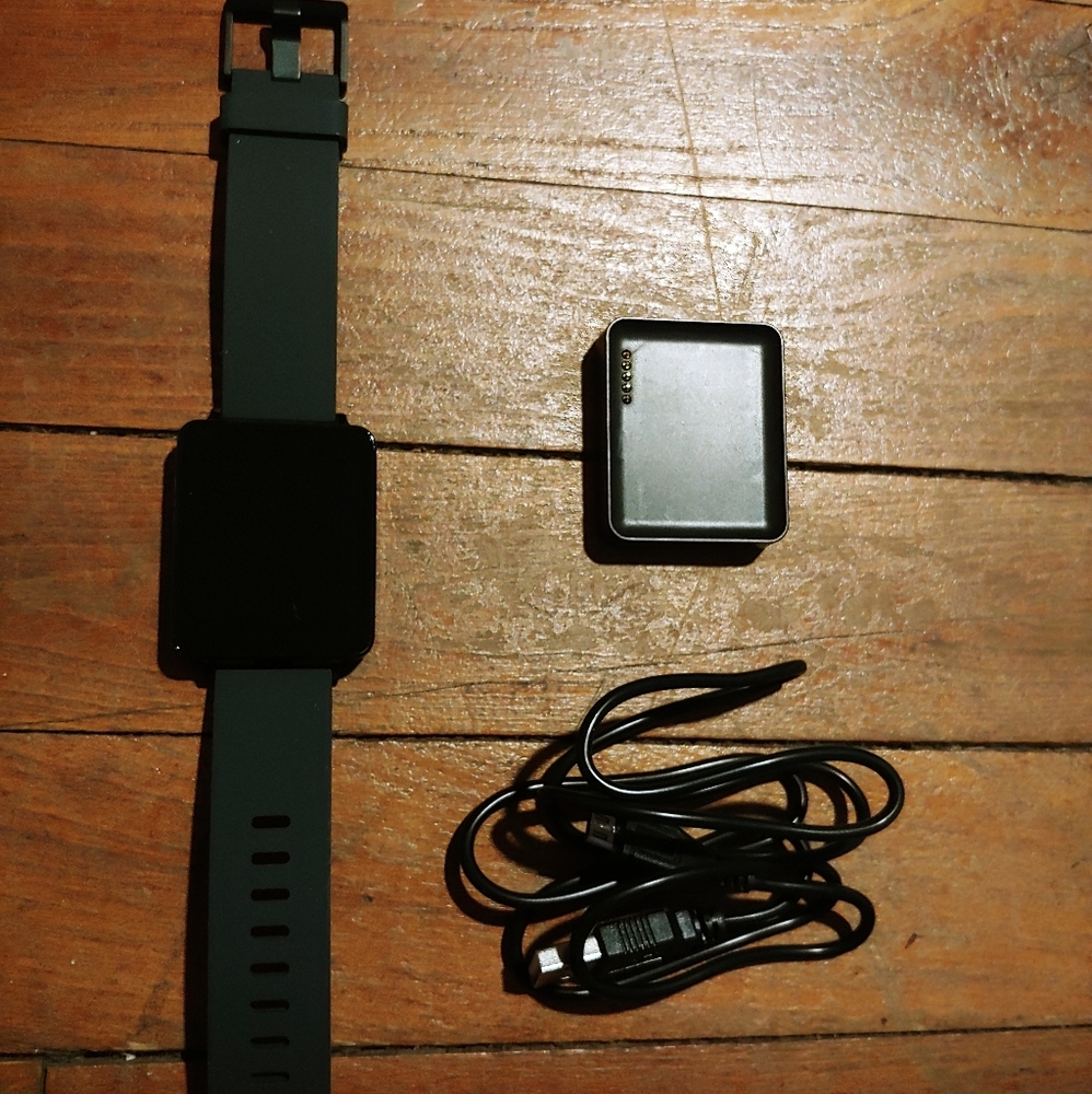 LG W100 smartwatch with charger